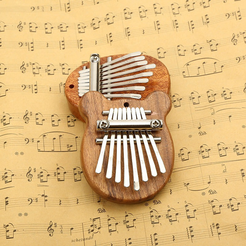 Mini 8-Note Kalimba Thumb Piano - Pocket-Sized Portable Instrument with Strap (Totoro/Heart/Bear/Oval Designs)